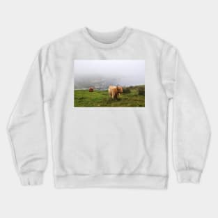 Highland cows on the misty coast of Islay, Scotland Crewneck Sweatshirt